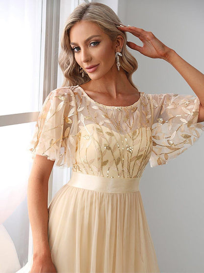 Robe longue de cérémonie à manches courtes avec broderie